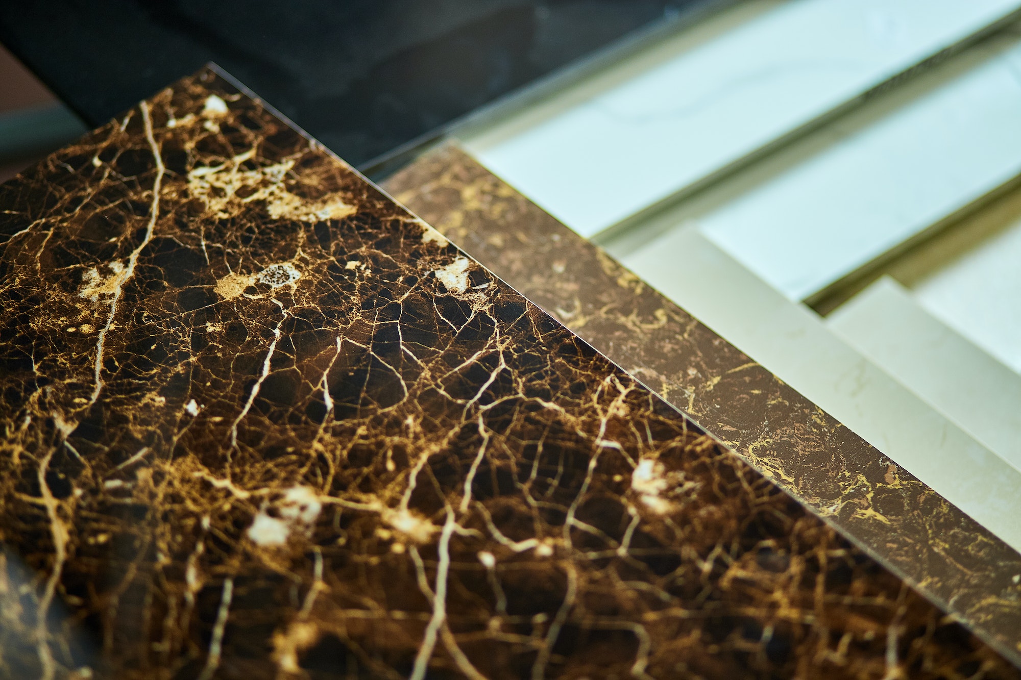 various-decorative-tiles-samples-colorful-samples-of-a-stone-tile-in-store.jpg